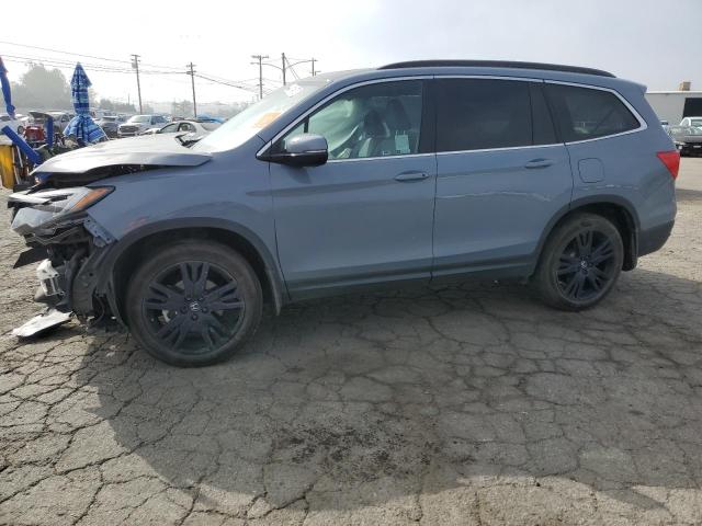 HONDA PILOT SE 2022 with VIN 5FNYF5H22NB022823 - Photo from auction