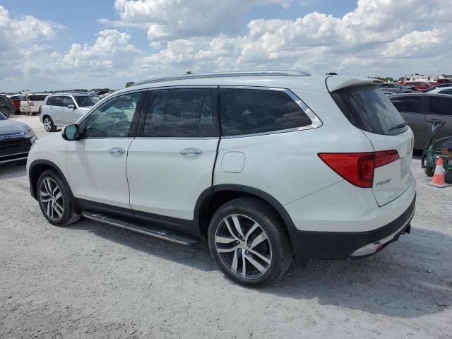 Photo 2 from auction – 2018 HONDA PILOT ELIT with VIN 5FNYF6H00JB019563