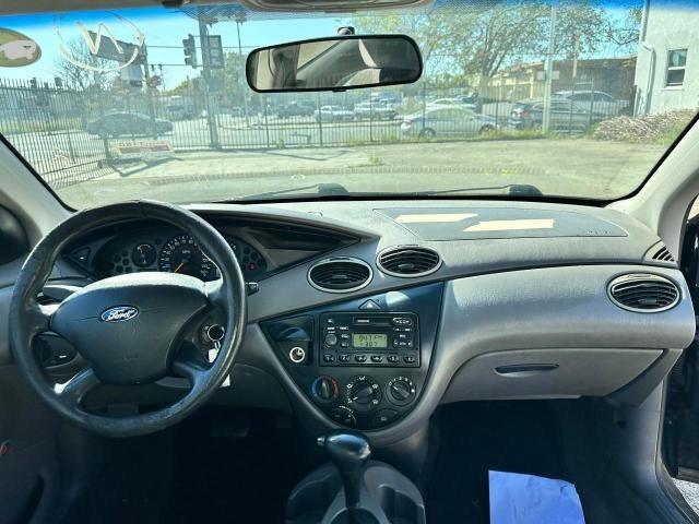 Photo 9 from auction – 2004 FORD FOCUS LX with VIN 1FAFP33Z24W137600