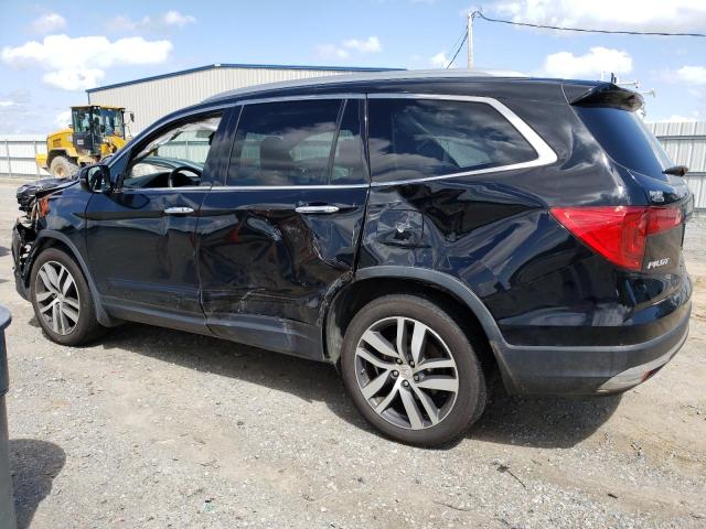 Photo 2 from auction – 2017 HONDA PILOT TOUR with VIN 5FNYF6H96HB064824