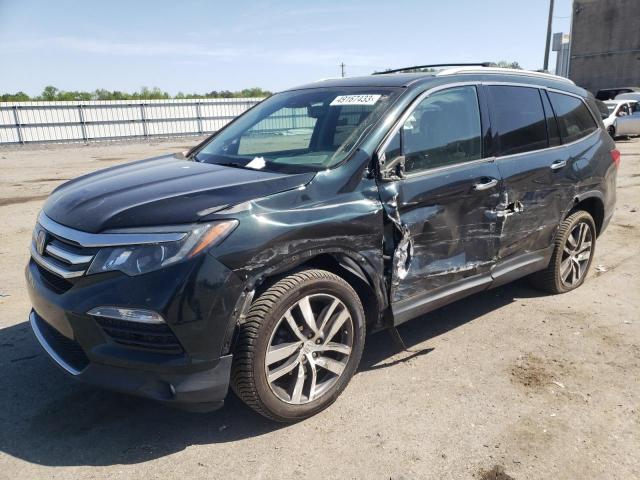 HONDA PILOT TOUR 2016 with VIN 5FNYF6H98GB101712 - Photo from auction