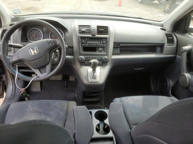 Photo 8 from auction – 2011 HONDA CR-V LX with VIN 5J6RE4H33BL003162