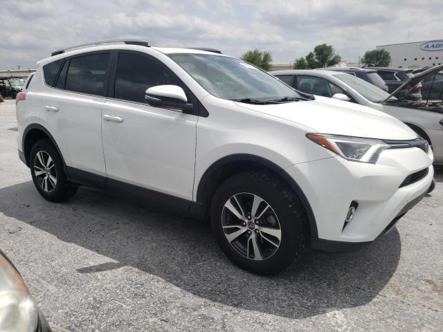 Photo 4 from auction – 2017 TOYOTA RAV4 XLE with VIN JTMWFREV6HD094956
