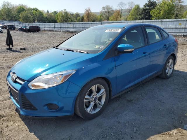 FORD FOCUS SE 2014 with VIN 1FADP3F21EL279509 - Photo from auction