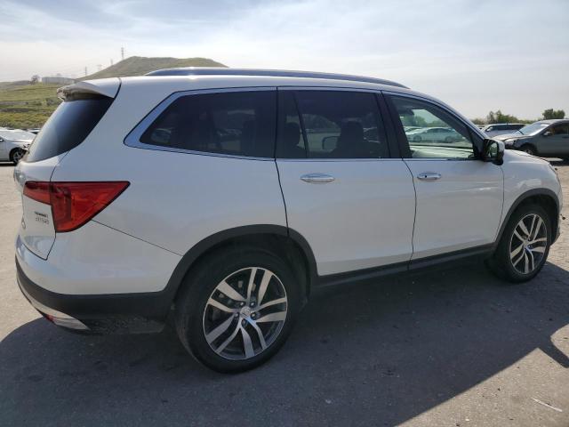 Photo 3 from auction – 2017 HONDA PILOT TOUR with VIN 5FNYF6H92HB012770