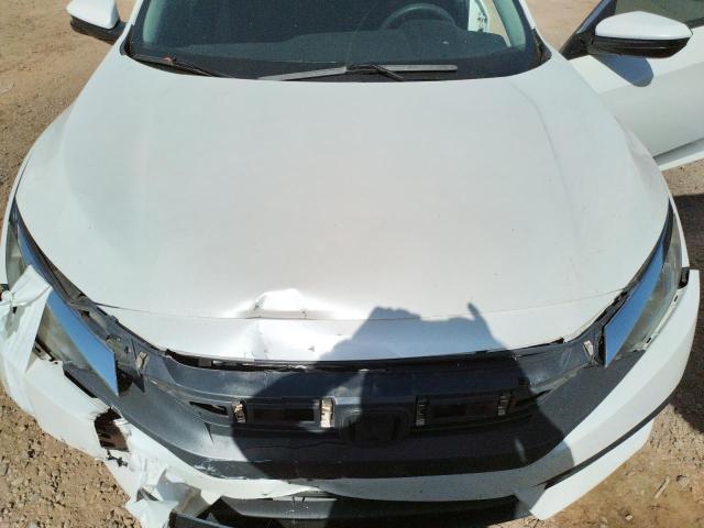 Photo 11 from auction – 2018 HONDA CIVIC EX with VIN 19XFC2F77JE017047
