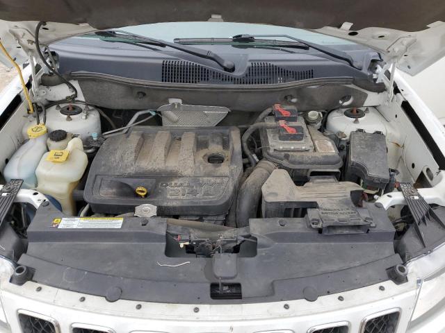 Photo 12 from auction – 2011 JEEP COMPASS SP with VIN 1J4NT1FB8BD290845