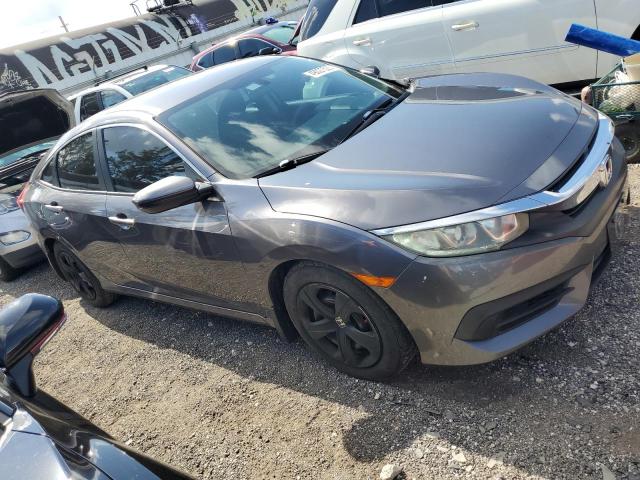 Photo 4 from auction – 2016 HONDA CIVIC LX with VIN 19XFC2F50GE059468