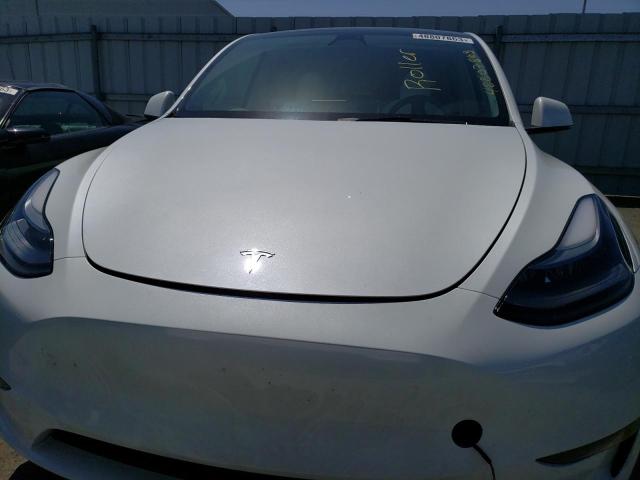 Photo 5 from auction – 2023 TESLA MODEL Y with VIN 7SAYGDEE0PF632277