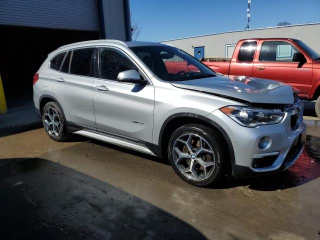 Photo 4 from auction – 2017 BMW X1 XDRIVE2 with VIN WBXHT3C30H5F77505