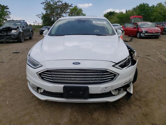 Photo 5 from auction – 2017 FORD FUSION TIT with VIN 3FA6P0D91HR270726