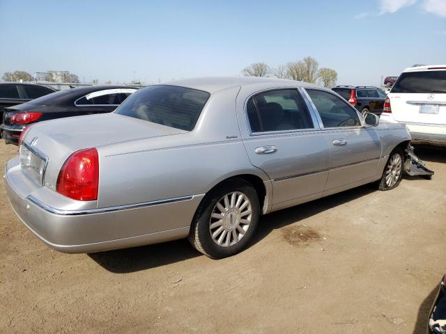 Photo 3 from auction – 2004 LINCOLN TOWN CAR E with VIN 1LNHM81W04Y627079