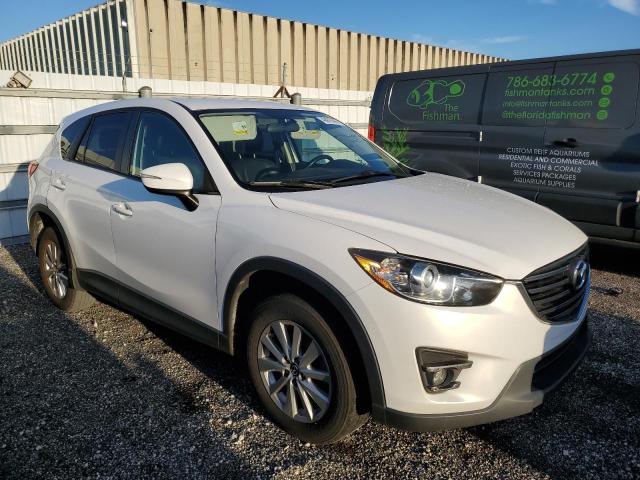 Photo 4 from auction – 2016 MAZDA CX-5 TOURI with VIN JM3KE2CY2G0766949