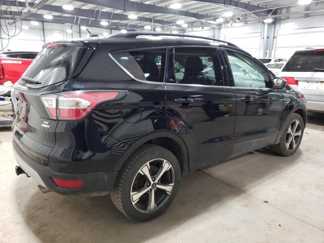 Photo 3 from auction – 2017 FORD ESCAPE SE with VIN 1FMCU9G95HUA23378