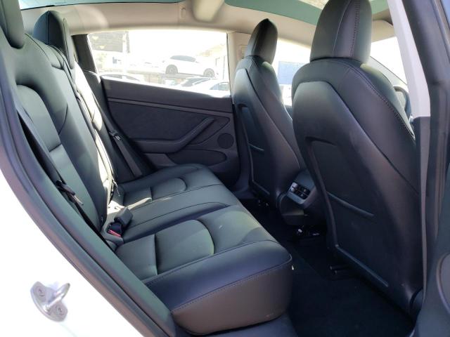 Photo 10 from auction – 2023 TESLA MODEL 3 with VIN 5YJ3E1EB3PF387797