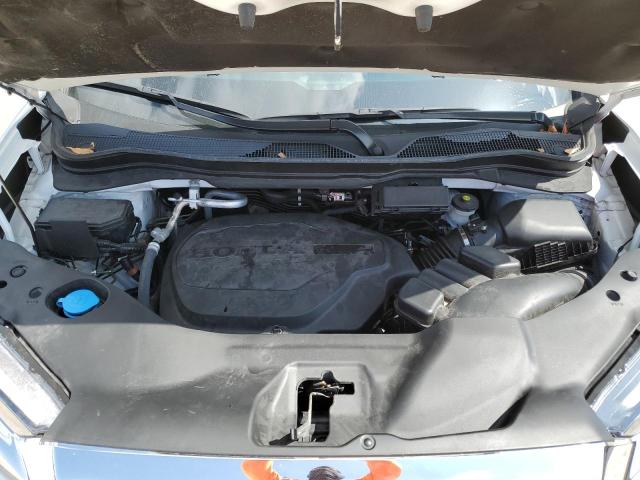 Photo 12 from auction – 2022 HONDA PASSPORT E with VIN 5FNYF7H54NB004121
