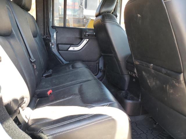Photo 11 from auction – 2014 JEEP WRANGLER U with VIN 1C4BJWFG6EL111509