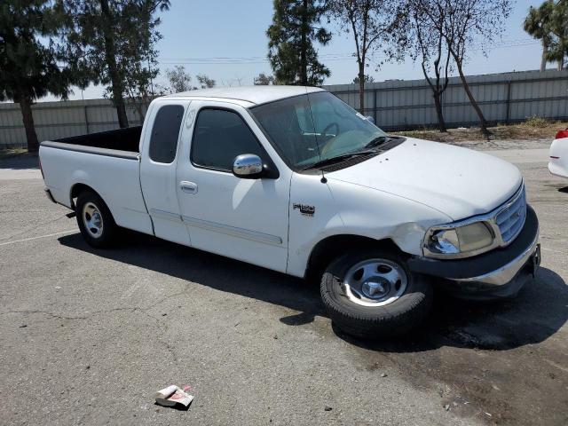 Photo 4 from auction – 2000 FORD F150 with VIN 1FTRX17W5YNB21575