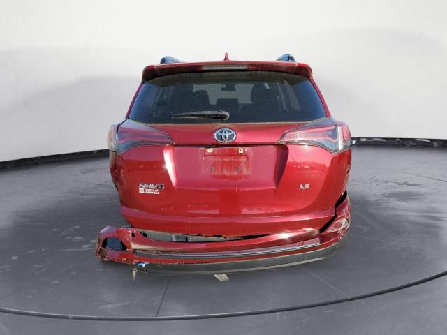 Photo 6 from auction – 2018 TOYOTA RAV4 LE with VIN JTMZFREV3JD121033