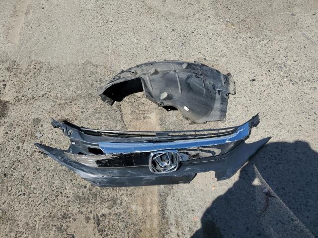 Photo 12 from auction – 2018 HONDA CIVIC EX with VIN 19XFC2F79JE205245