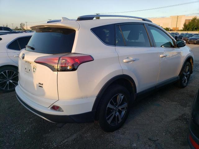 Photo 3 from auction – 2016 TOYOTA RAV4 XLE with VIN 2T3RFREV6GW456735