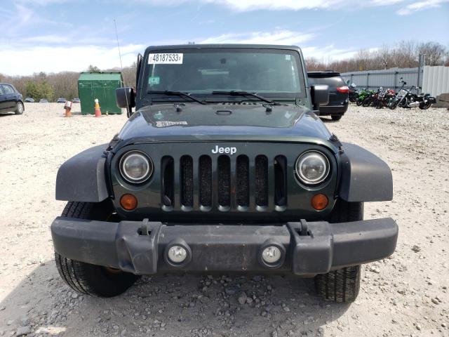 Photo 5 from auction – 2011 JEEP WRANGLER U with VIN 1J4BA3H15BL525409