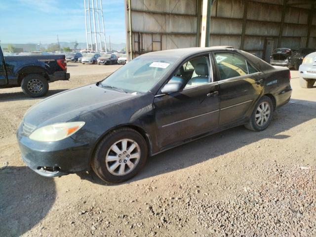 TOYOTA CAMRY LE 2003 with VIN 4T1BE32K63U238938 - Photo from auction