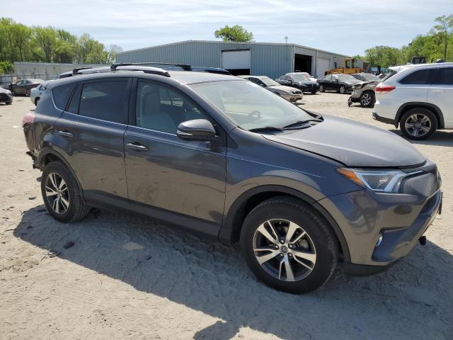 Photo 4 from auction – 2017 TOYOTA RAV4 XLE with VIN JTMRFREV1HJ704230