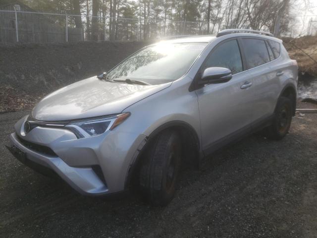 TOYOTA RAV4 LE 2018 with VIN 2T3BFREV5JW814447 - Photo from auction