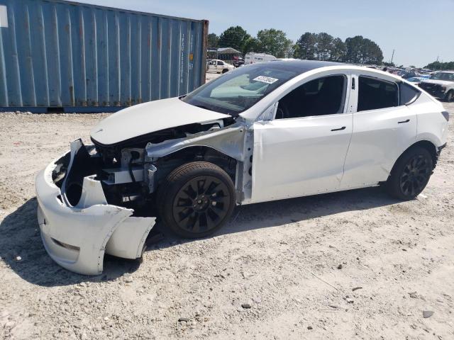 TESLA MODEL Y 2023 with VIN 7SAYGDEE8PF676107 - Photo from auction