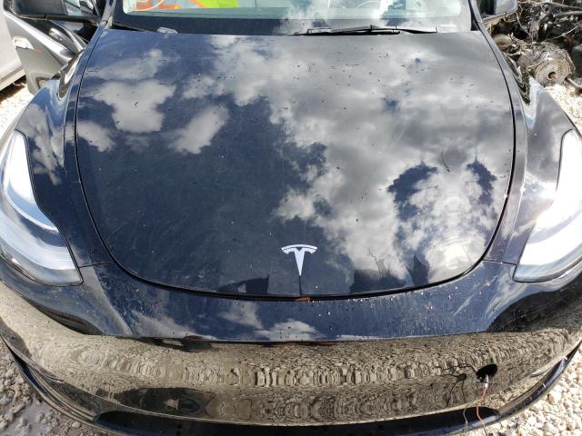 Photo 12 from auction – 2021 TESLA MODEL Y with VIN 5YJYGAEE0MF228645