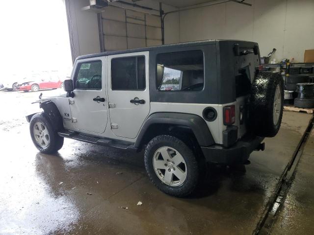 Photo 2 from auction – 2009 JEEP WRANGLER U with VIN 1J4GB39199L754638