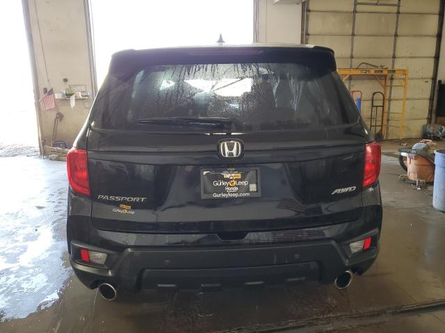Photo 6 from auction – 2022 HONDA PASSPORT E with VIN 5FNYF8H50NB024632