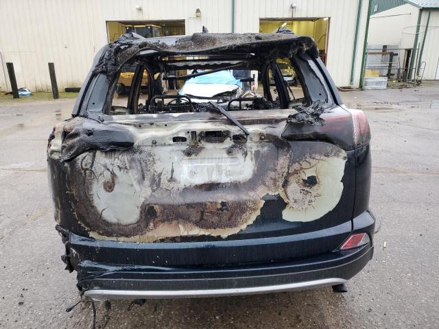 Photo 6 from auction – 2017 TOYOTA RAV4 XLE with VIN JTMWFREV6HD101579