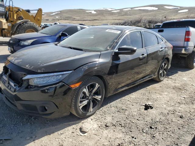 HONDA CIVIC TOUR 2016 with VIN 19XFC1F98GE024142 - Photo from auction