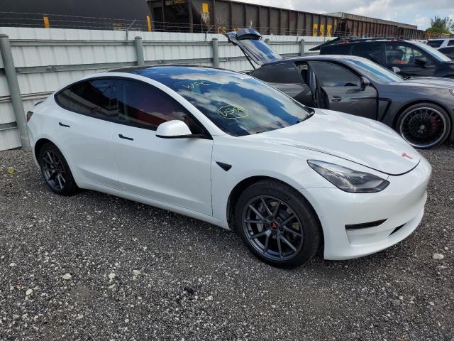 Photo 4 from auction – 2021 TESLA MODEL 3 with VIN 5YJ3E1EA0MF099514