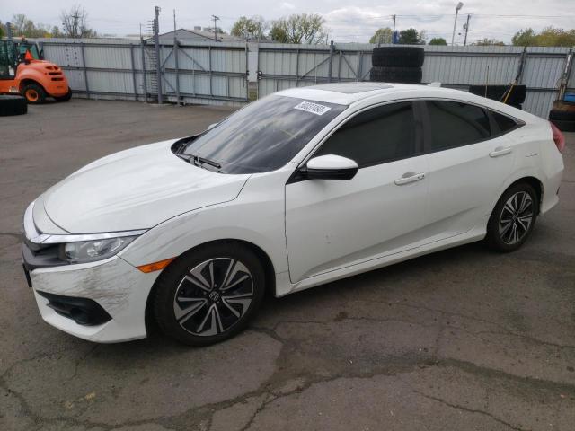 HONDA CIVIC EX 2018 with VIN JHMFC1F34JX035978 - Photo from auction