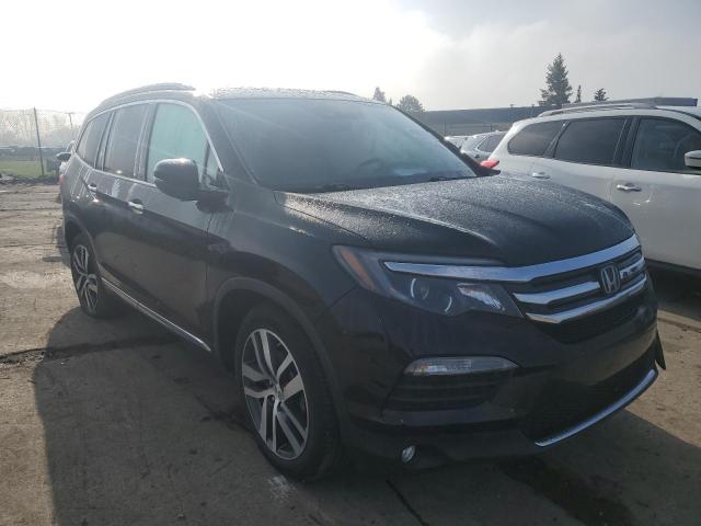 Photo 4 from auction – 2017 HONDA PILOT ELIT with VIN 5FNYF6H09HB088780