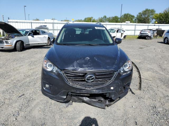 Photo 5 from auction – 2016 MAZDA CX-5 TOURI with VIN JM3KE2CY3G0695034