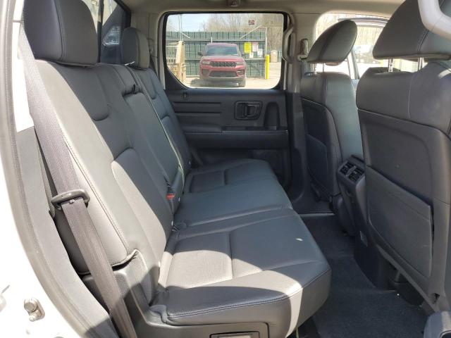 Photo 10 from auction – 2014 HONDA RIDGELINE with VIN 5FPYK1F63EB013095