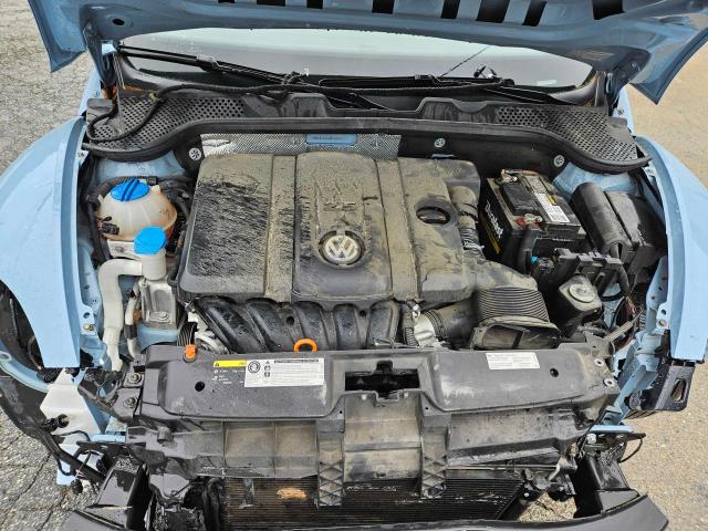 Photo 7 from auction – 2013 VOLKSWAGEN BEETLE with VIN 3VWJX7AT4DM662276