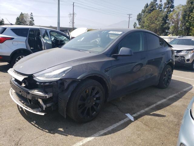 TESLA MODEL Y 2021 with VIN 5YJYGAEE0MF274010 - Photo from auction