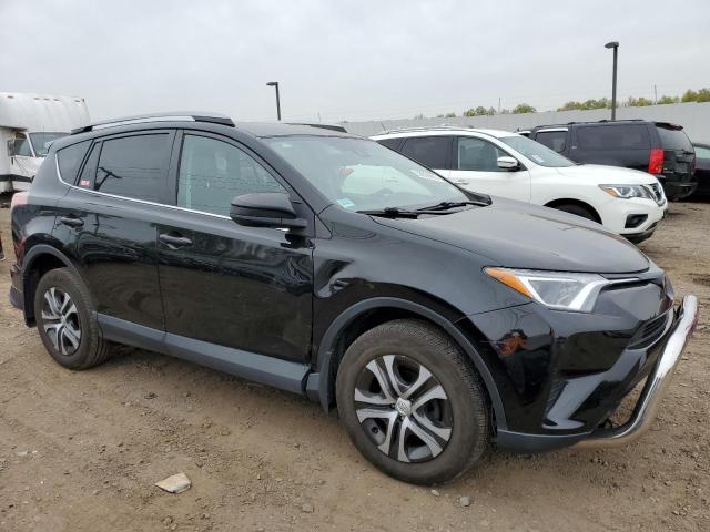 Photo 4 from auction – 2018 TOYOTA RAV4 LE with VIN 2T3BFREV8JW719641