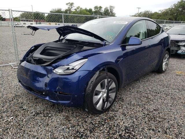 TESLA MODEL Y 2023 with VIN 7SAYGDEE6PA087702 - Photo from auction