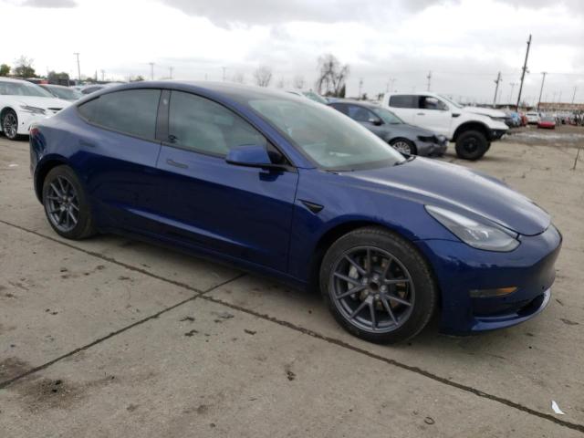 Photo 4 from auction – 2021 TESLA MODEL 3 with VIN 5YJ3E1EA7MF987404