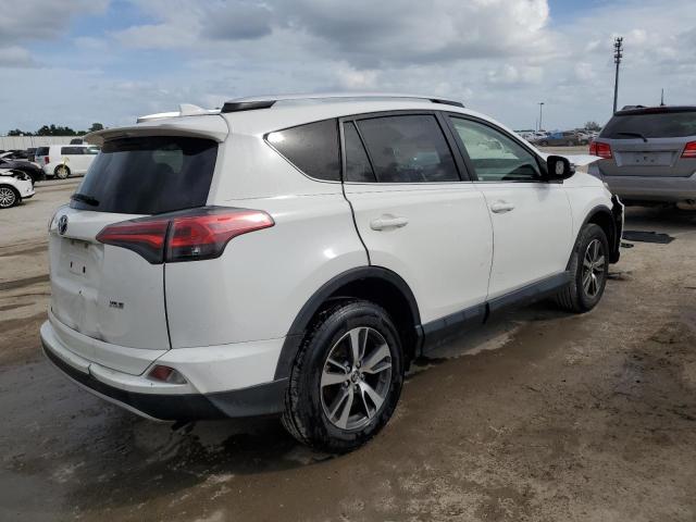 Photo 3 from auction – 2016 TOYOTA RAV4 XLE with VIN JTMWFREV7GJ083478