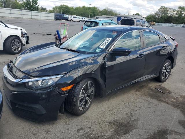 HONDA CIVIC EX 2018 with VIN 2HGFC2F77JH530286 - Photo from auction