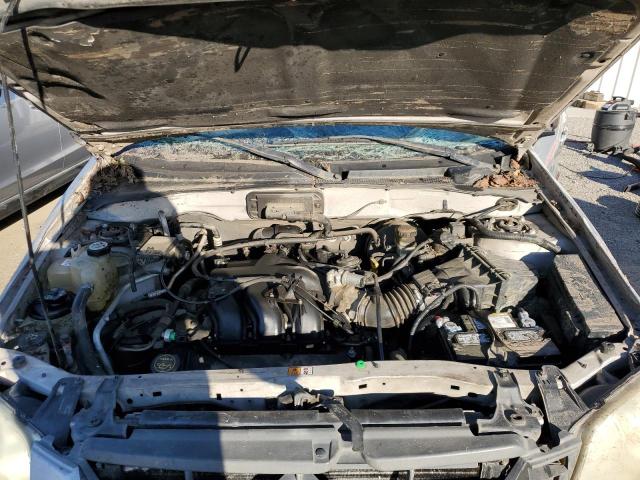 Photo 12 from auction – 2004 MAZDA TRIBUTE ES with VIN 4F2CZ06164KM32573