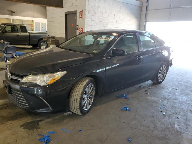TOYOTA CAMRY LE 2017 with VIN 4T1BF1FKXHU657099 - Photo from auction