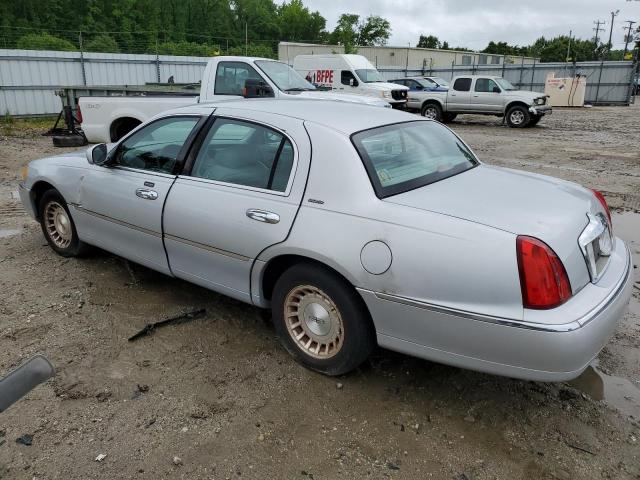 Photo 2 from auction – 1999 LINCOLN TOWN CAR E with VIN 1LNHM81W9XY679394